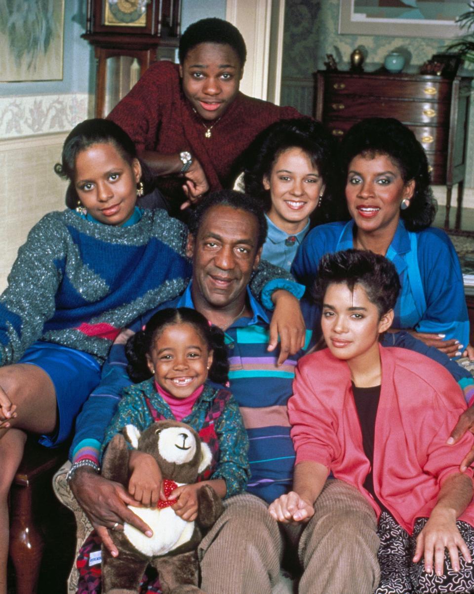 The cast of "The Cosby Show," featuring Malcolm-Jamal Warner as Theodore 'Theo' Huxtable, Sabrina Le Beauf as Sondra Huxtable Tibideaux, Phylicia Rashad as Clair Hanks Huxtable, Lisa Bonet as Denise Huxtable, Bill Cosby as Dr. Heathcliff 'Cliff' Huxtable, Keshia Knight Pulliam as Rudy Huxtable, Tempestt Bledsoe as Vanessa Huxtable.