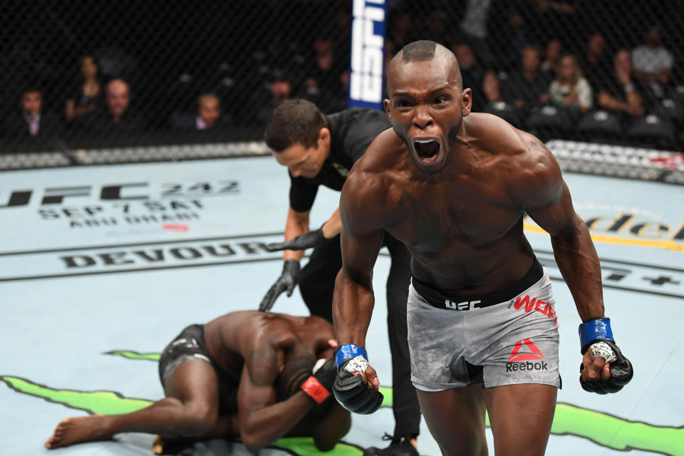 ANAHEIM, CALIFORNIA - AUGUST 17:  (R-L) Khama Worthy celebrates his TKO victory over Devonte Smith in their lightweight bout during the UFC 241 event at the Honda Center on August 17, 2019 in Anaheim, California. (Photo by Josh Hedges/Zuffa LLC/Zuffa LLC via Getty Images)