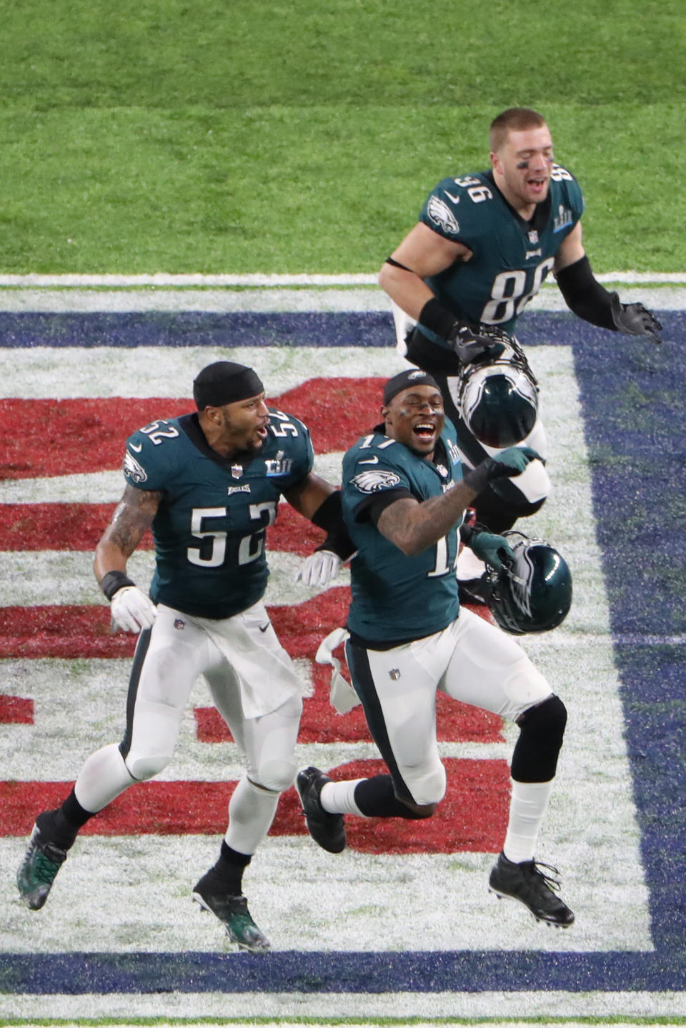 <p>Philadelphia Eagles outside linebacker Najee Goode (52) and wide receiver Alshon Jeffery (17) and tight end Zach Ertz (86) celebrate after defeating the New England Patriots in Super Bowl LII at U.S. Bank Stadium. Mandatory Credit: Kevin Jairaj-USA TODAY Sports </p>