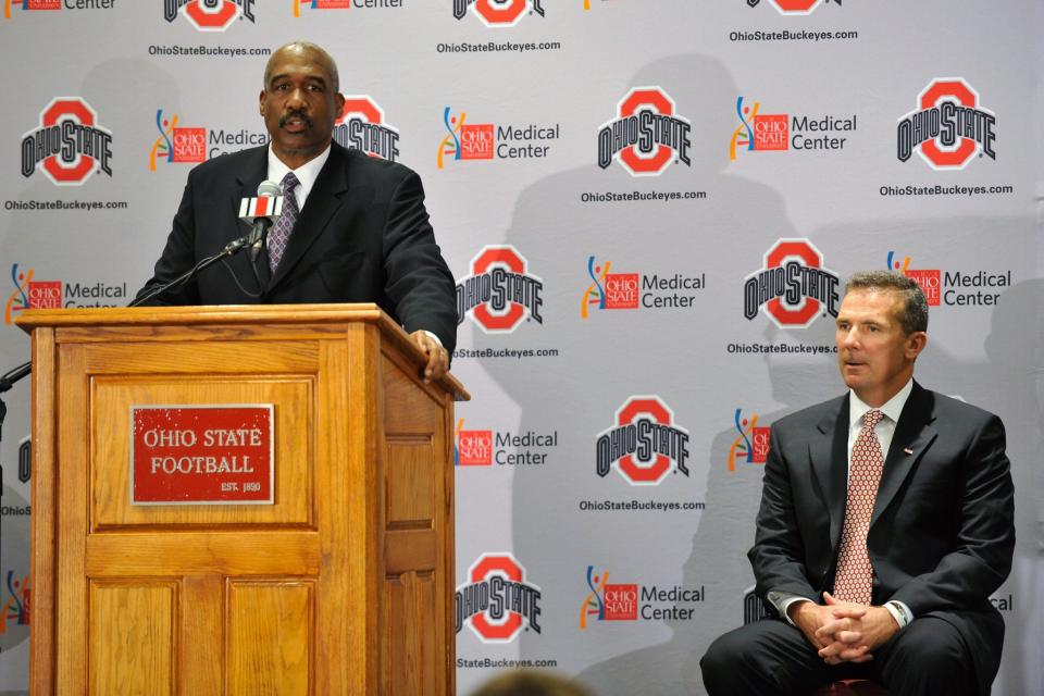 Ohio State AD Gene Smith introduced Urban Meyer as the team's coach in 2011. (Getty)