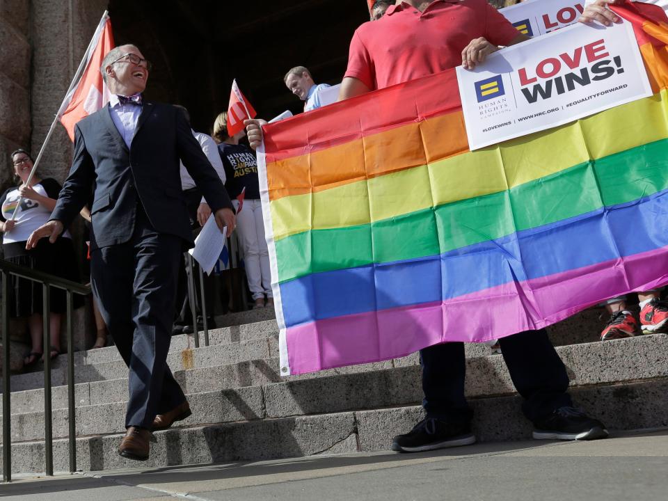 Jim Obergefell arrives for a news conference on the steps of the Texas Capitol.