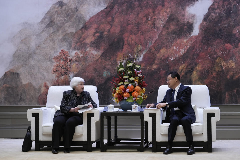 U.S. Treasury Secretary Janet Yellen, left meets with Wang Weizhong, deputy party secretary and governor of Guangdong, center at the Baiyun International Conference Center (BICC) in southern China's Guangdong province, Friday, April 5, 2024. Yellen has arrived in China for five days of meetings in a country that's determined to avoid open conflict with the United States. (AP Photo/Andy Wong, Pool)