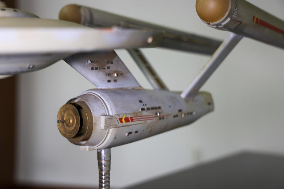 The first model of the USS Enterprise is displayed at Heritage Auctions in Los Angeles, April 13, 2024. The model — used in the original “Star Trek” television series — has been returned to Eugene “Rod” Roddenberry, the son of “Star Trek” creator Gene Roddenberry, decades after it went missing in the 1970s. (Josh David Jordan/Heritage Auctions via AP)