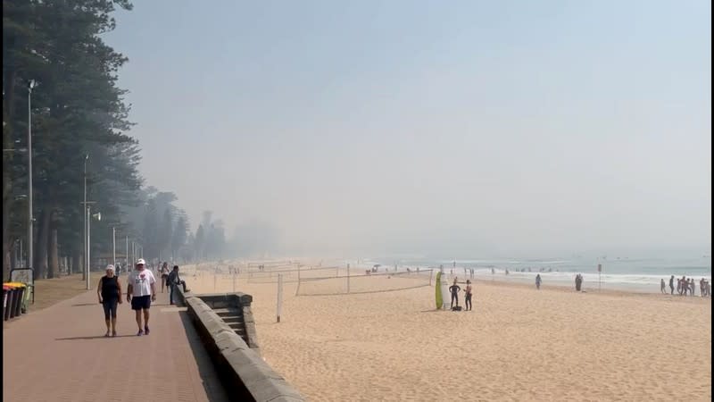 Still image taken from a social media video shows haze blanketing Manly Beach in Sydney, Australia