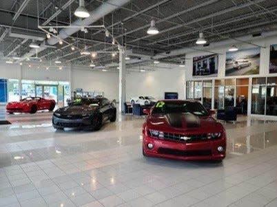 The new car showroom at Matick Chevrolet in Redford displays used cars on Sept. 15, 2021, because new car inventory is so scarce amid a global semiconductor chips shortage across the auto industry.