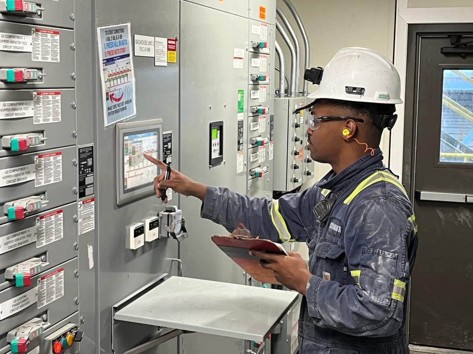 Orgelio "Jay" Soares is seen on the job at Covanta's SEMASS facility in Wareham, where he works as an auxiliary operator. Soares immigrated from Zambia in East Africa to New Bedford with his family when he was a child and attended Greater New Bedford Regional Vocational Technical High School, where he found his interest in stationary engineering.