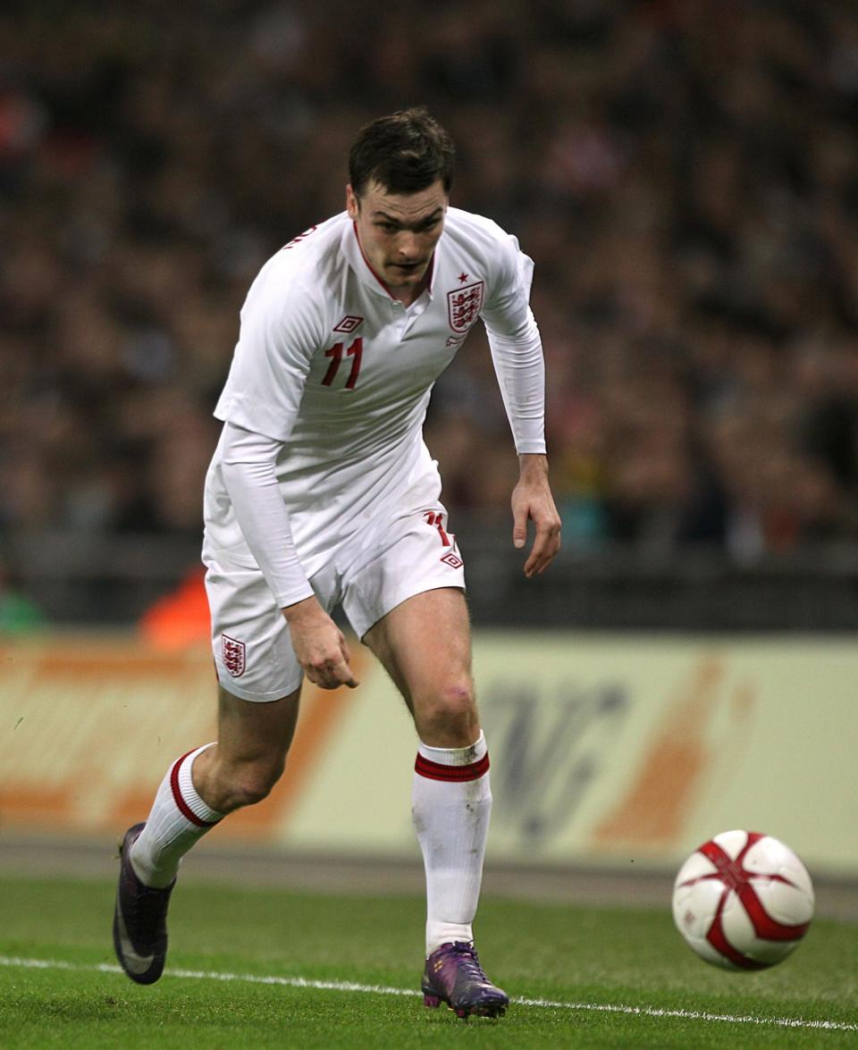 Adam Johnson playing for England in 2012 (PA)