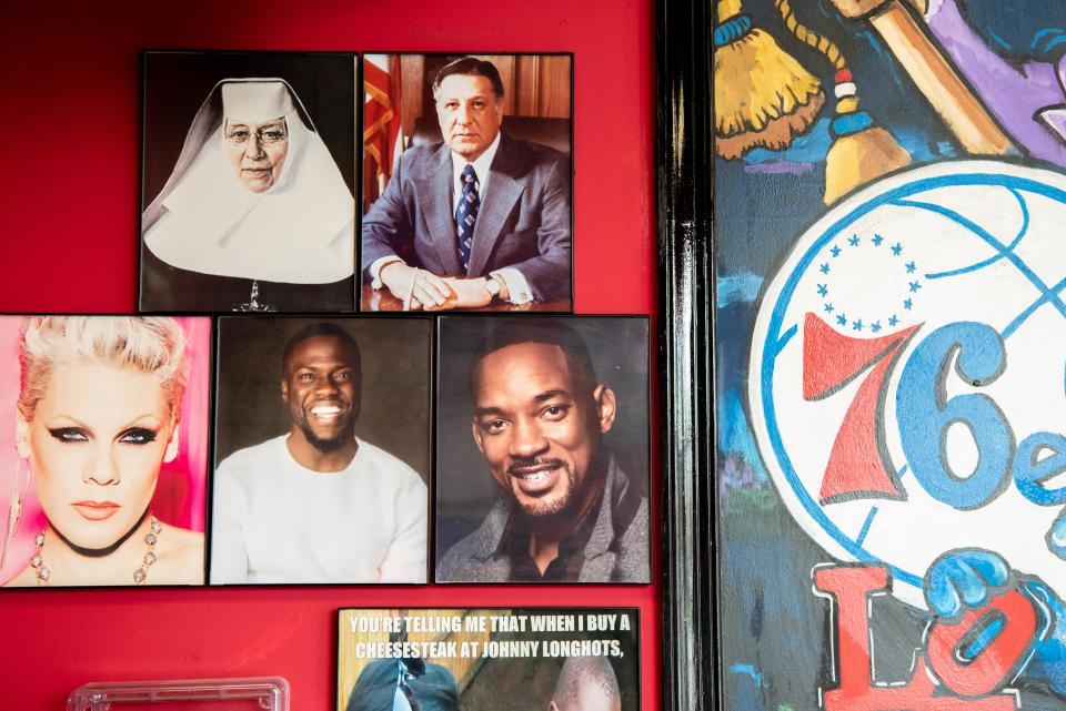 The walls at Johnny Longhots, in Bristol Township, display photos of Philadelphia icons, like St. Katherine Drexel, top left, and Frank Rizzo, top right.