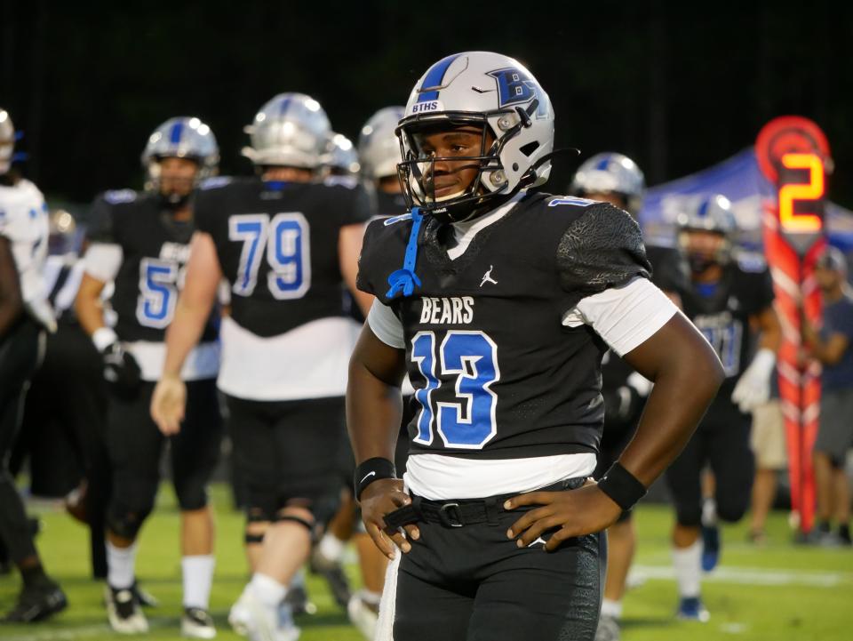 Bartram Trail QB Jaden Weatherly pauses in a timeout during a high school football game against Mainland on September 8, 2023. [Will Clayton/For the Times-Union]