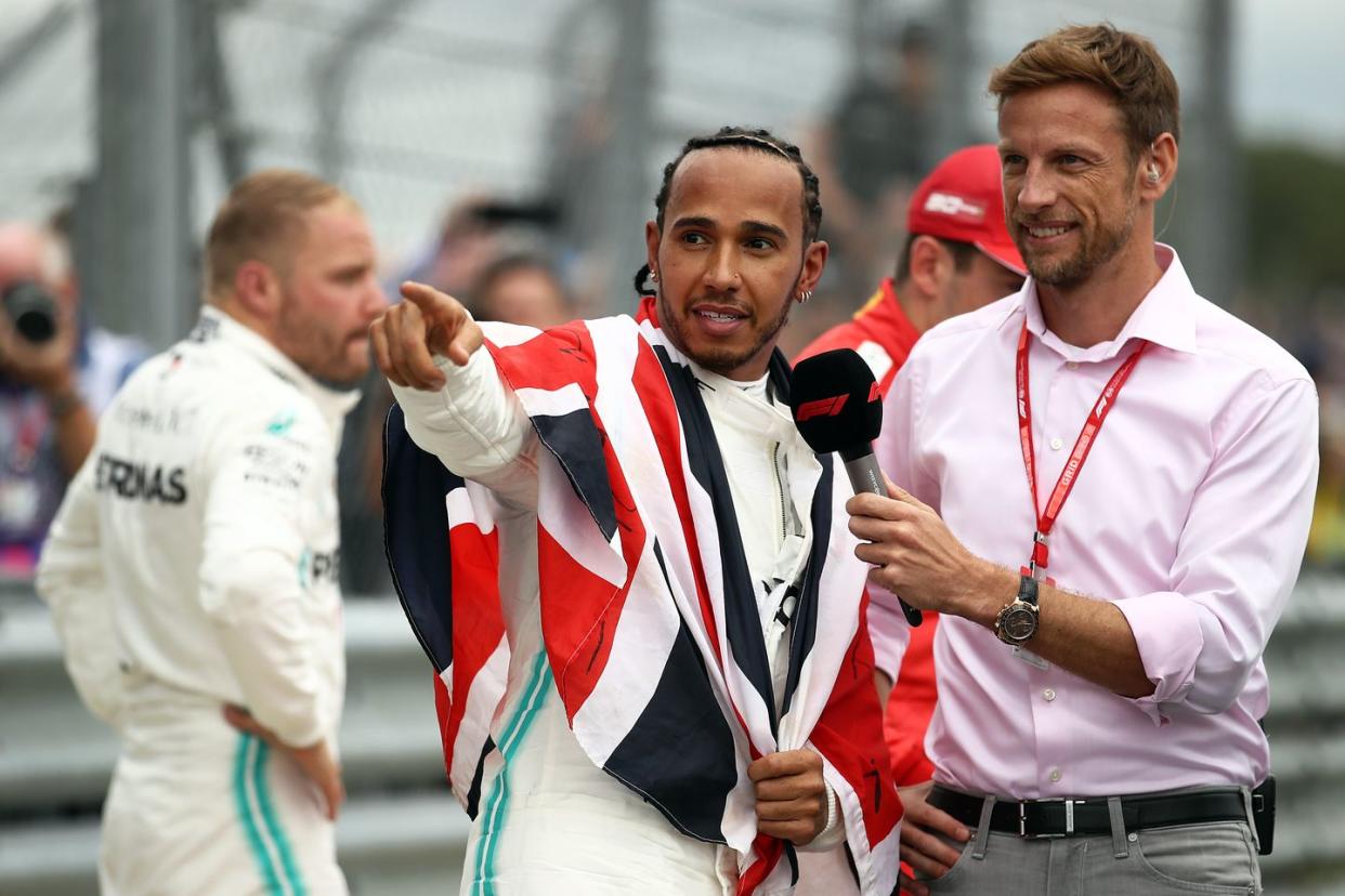 northampton, england july 14 race winner lewis hamilton of great britain and mercedes gp talks with 2009 f1 world drivers champion jenson button in parc ferme during the f1 grand prix of great britain at silverstone on july 14, 2019 in northampton, england photo by bryn lennongetty images