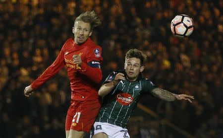 Football Soccer Britain - Plymouth Argyle v Liverpool - FA Cup Third Round Replay - Home Park - 18/1/17 Plymouth Argyle's David Fox in action with Liverpool's Lucas Leiva Action Images via Reuters / Paul Childs Livepic