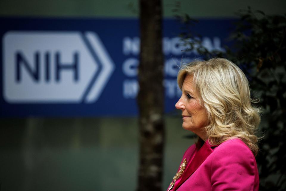 First lady Jill Biden tours the National Cancer Institute with Jodie Haydon (not pictured), partner of of Australian Prime Minister Anthony Albanese, at the National Institute of Health in Bethesda, Md., on Oct. 25. The visit today showcases the collaboration between U.S. and Australian researchers in pediatric cancer research