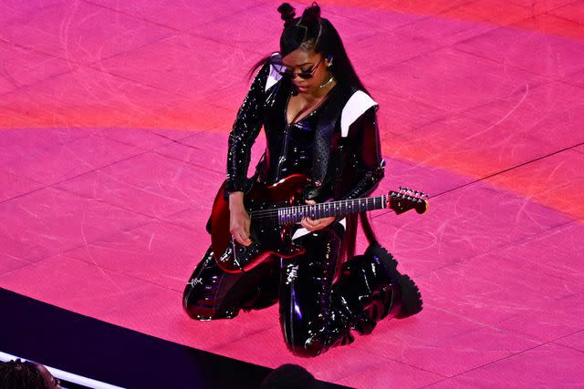 <p> PATRICK T. FALLON/AFP via Getty</p> H.E.R. performs during Apple Music halftime show of Super Bowl LVIII between the Kansas City Chiefs and the San Francisco 49ers at Allegiant Stadium in Las Vegas, Nevada, February 11, 2024.