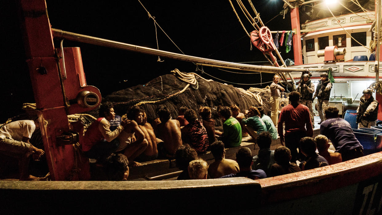 Workers on a fishing ship.