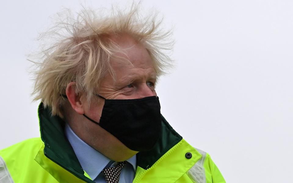 Boris Johnson visited some of the flood-hit communities in Manchester yesterday - Reuters