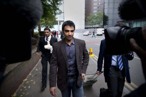 Former Pakistan cricket captain Salman Butt (C) leaves Southwark Crown Court in central London on October 5, 2011. Cricket Australia on Tuesday said it was not aware of any evidence implicating Australian players in match-fixing and slammed the credibility of the man who made the claims in a London court