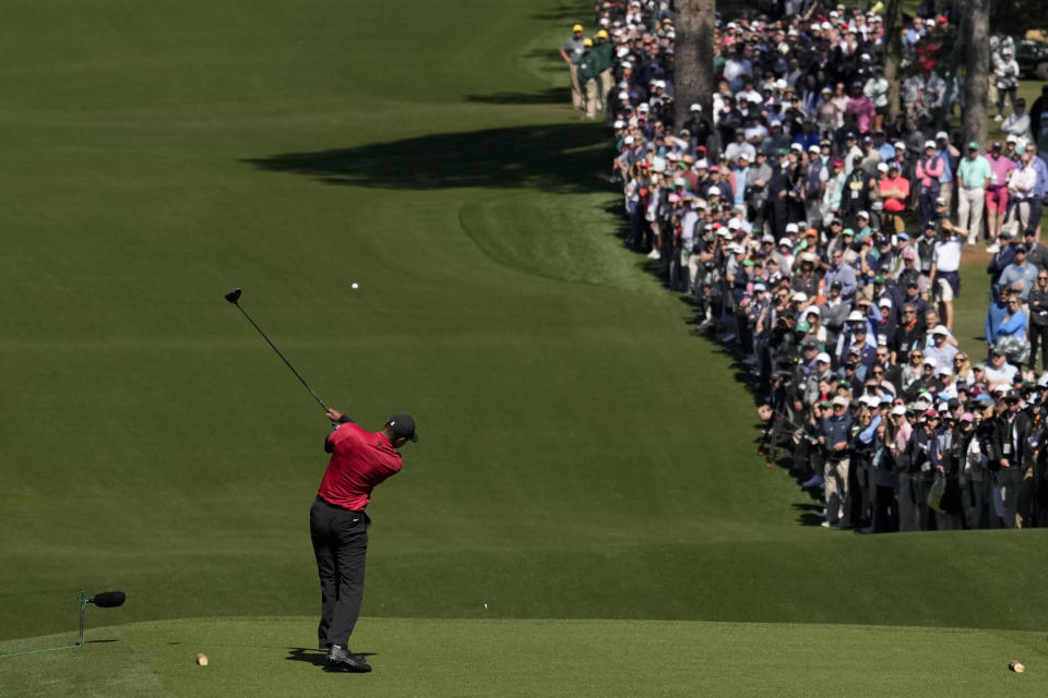 Tiger Woods hits his tee shot on the third hole during the final round at the Masters golf tournament on Sunday, April 10, 2022, in Augusta, Ga. (AP Photo/Jae C. Hong)