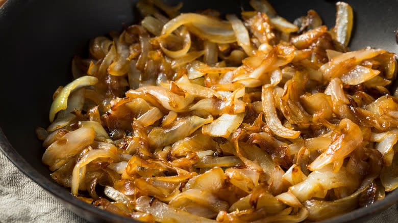 Close-up of caramelized onions in a pan