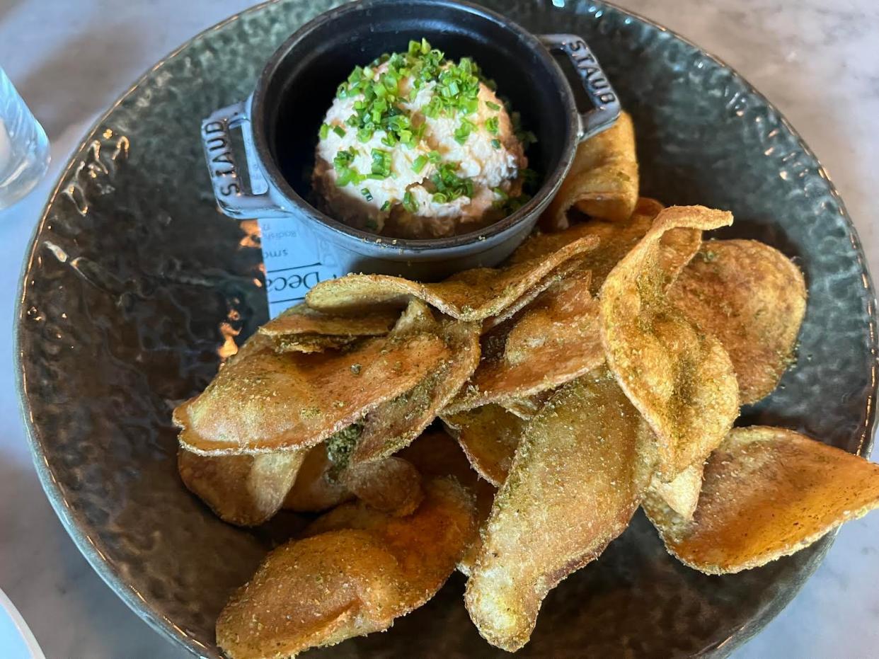 Decade, 1076 E. Washington St., recently launched a new happy hour menu with food items including jalape?o chips and beer cheese.