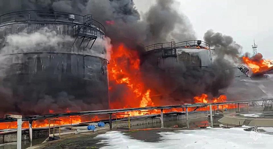 FILE - In this photo taken from video released by the Telegram channel of Bryansk Gov. Alexander Bogomaz on Friday, Jan. 19, 2024, oil tanks are seen on fire after the drone attack in Klintsy, a city in Russia’s Bryansk region, about 60 kilometers (40 miles) from the Russia-Ukrainian border. Such attacks are dealing a heavy blow to President Vladimir Putin’s attempts to reassure Russians that life in the country is largely untouched by the nearly 2-year-old conflict. (Bryansk Gov. Alexander Bogomaz Telegram channel AV BogomaZ via AP, File)