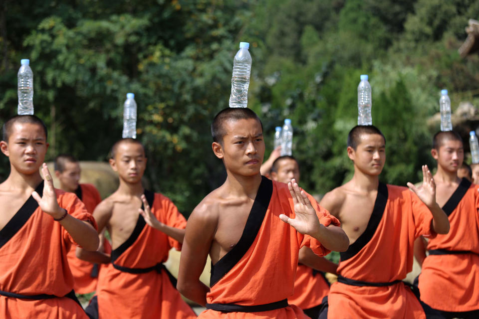 Shaolin Monks Practice Martial Arts In China