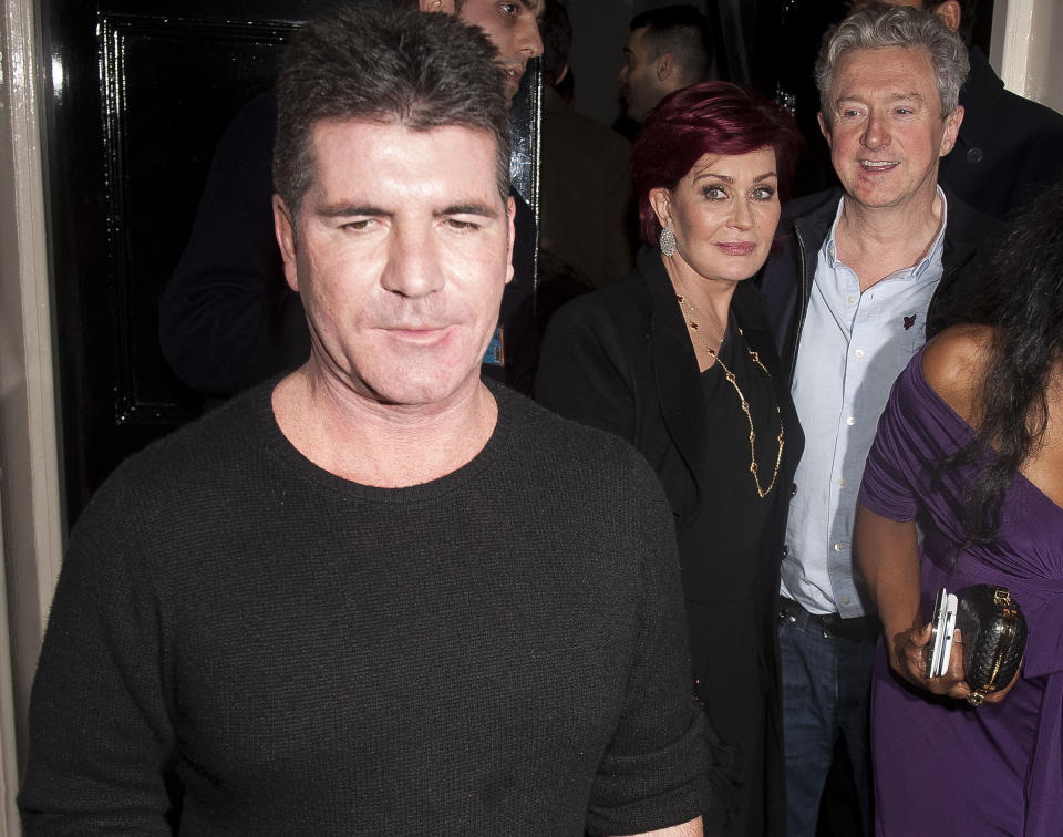 LONDON, UNITED KINGDOM - FEBRUARY 15: Simon Cowell, Sharon Osbourne and Louis Walsh sighting on February 15, 2013 in London, England. (Photo by Niki Nikolova/FilmMagic)