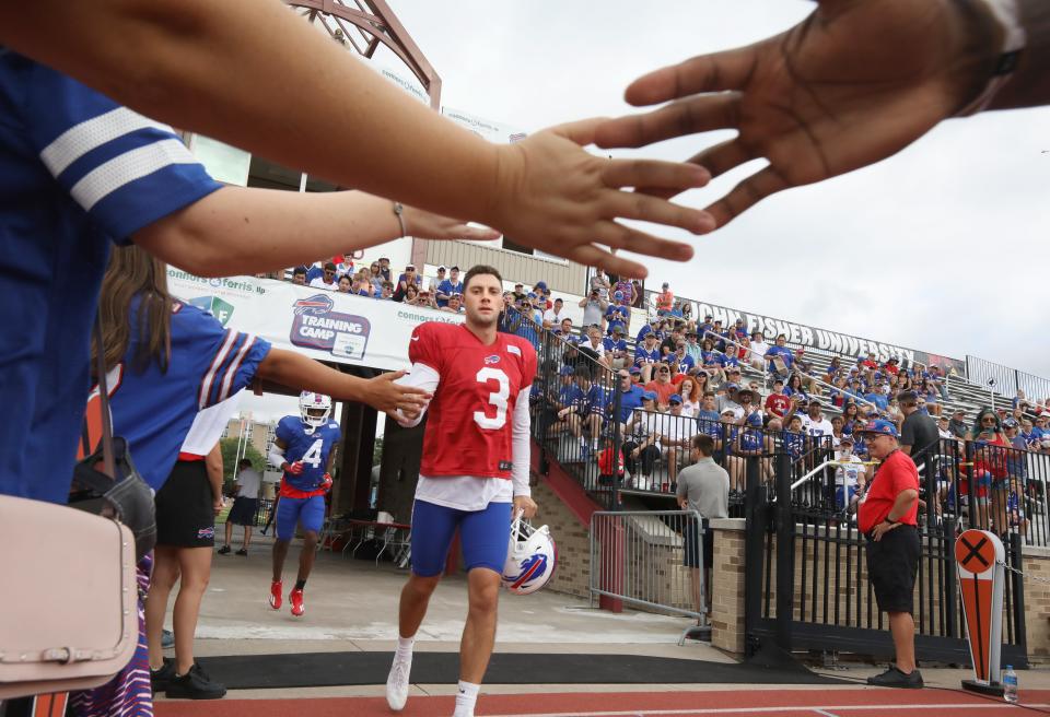 Bills punter Matt Haack high-fives fans as he takes the field for day eight of the Buffalo Bills training camp at St John Fisher University in Rochester Tuesday, August 2, 2022. 