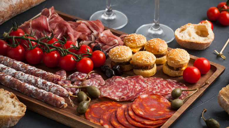 platter with tomatoes and meats