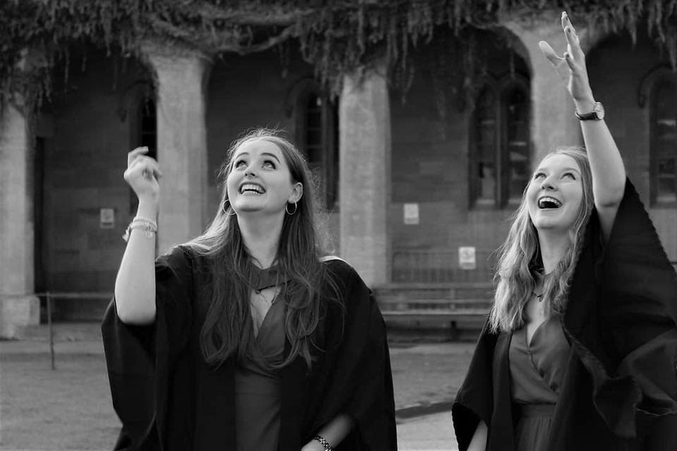 Grace Millane, left, is photographed celebrating graduation in September. (Photo: Facebook, Grace Emmie Rose Millane)