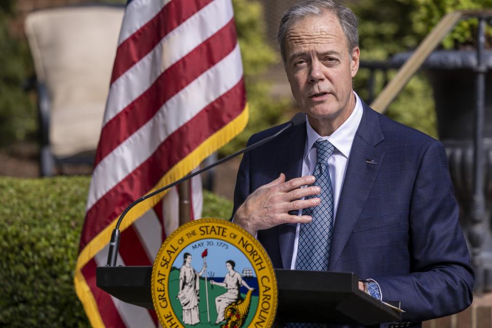 Wolfspeed CEO Gregg Lowe speaks during an economic development announcement ceremony at the Executive Mansion Friday, Sept. 9, 2022 in Raleigh, N.C. Wolfspeed, a Durham silicon chip manufacturer, will build a new factory in Chatham County promising 1,800 new jobs. (Travis Long/The News & Observer via AP)