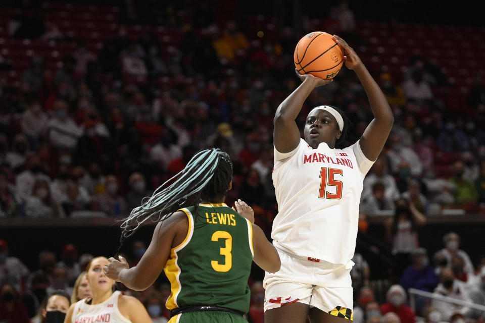 Maryland guard Ashley Owusu (15) shoots against Baylor guard Jordan Lewis (3) during the second half of an NCAA college basketball game, Sunday, Nov. 21, 2021, in College Park, Md. (AP Photo/Nick Wass)