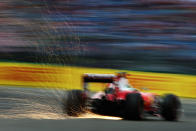 <p>Sparks fly behind Sebastian Vettel of Germany driving the (5) Scuderia Ferrari SF16-H Ferrari 059/5 turbo (Shell GP) on track during final practice for the Formula One Grand Prix of Germany at Hockenheimring on July 30, 2016 in Hockenheim, Germany. (Photo: Charles Coates/Getty Images) </p>