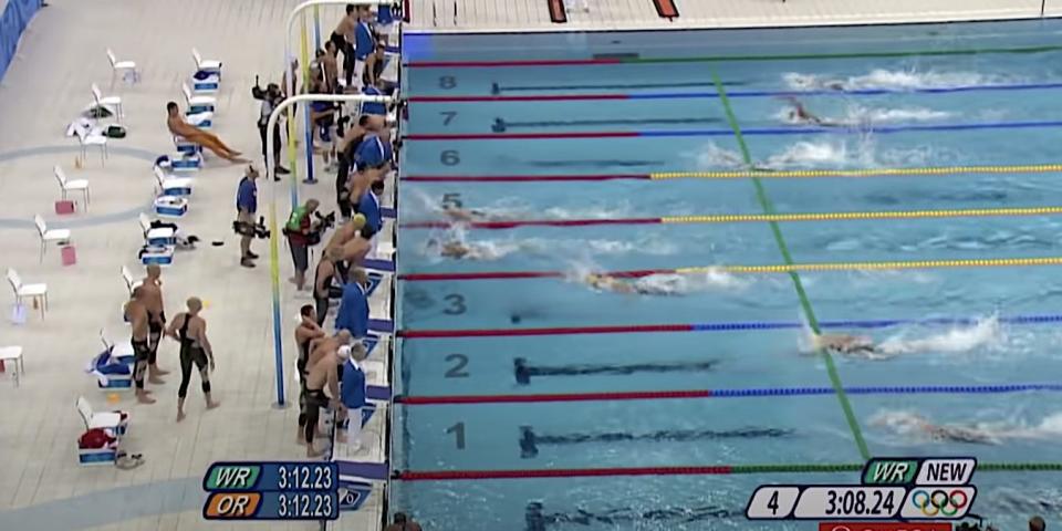 Screenshot shows the U.S. winning the 2008 Olympic 4x100 swimming relay.