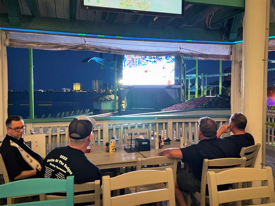 Several SPHL owners watch the Stanley Cup playoffs this week from the hotel lounge at the Holiday Inn Resort on Pensacola Beach.