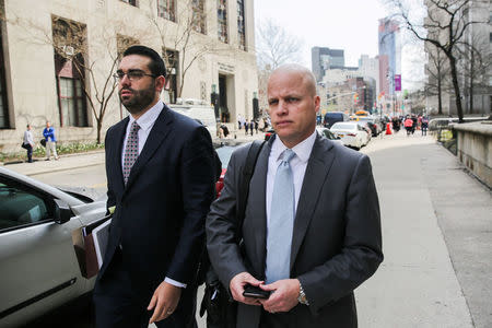Michael Cohen's Attorneys Todd Harrison (R) and Joseph Evans are pictured outside the Manhattan Federal Court in New York City, New York, U.S., April 13, 2018. REUTERS/Jeenah Moon