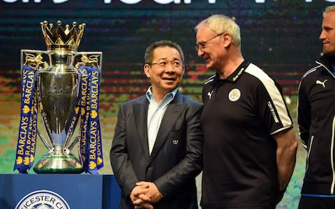 Vichai Srivaddhanaprabha with Claudio Ranieri and the Premier League trophy  - Credit: Getty images