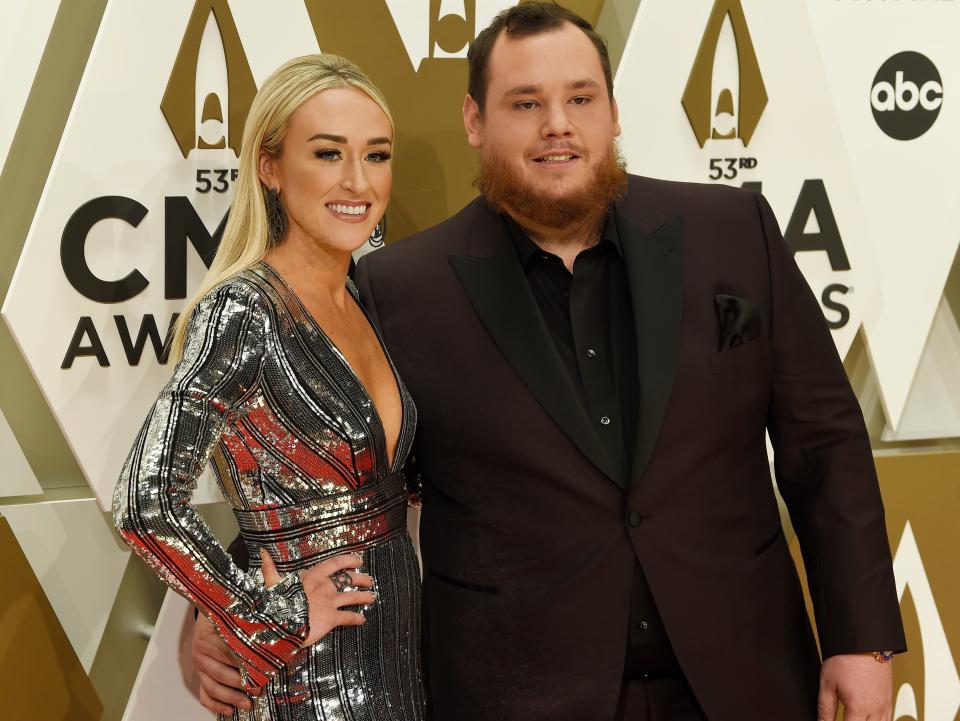 Luke Combs and Nicole Hocking on the red carpet at the 53rd Annual CMA Awards at Music City Center Wednesday, Nov. 13, 2019 in Nashville, Tenn.