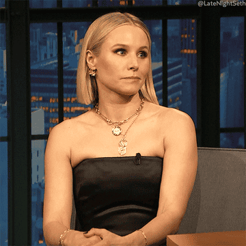 Kristen Bell waves her finger and shakes her head "no" on "Late Night with Seth Meyers"