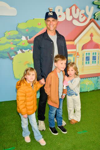 <p>Jerod Harris/Getty</p> Sam Page and his children