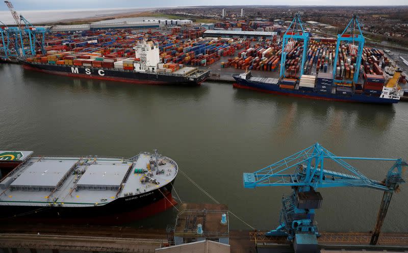 FILE PHOTO: A container ship is unloaded at Peel Ports Liverpool container terminal in Liverpool