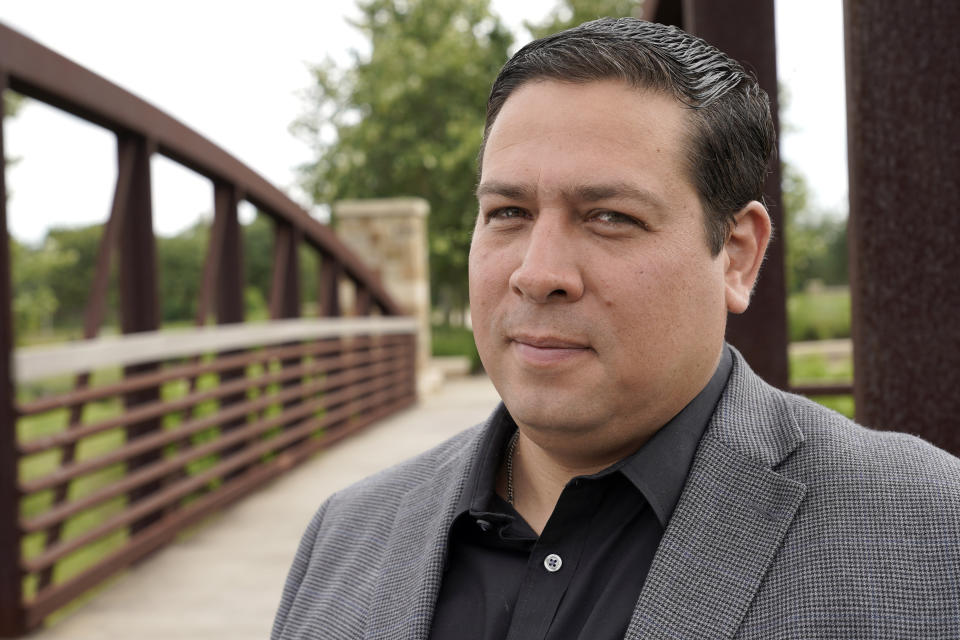 Jose Sagaseta poses for a photograph near his home in Fulshear, Texas, Monday, May 4, 2020. Sagaseta thought his job of eight years with an oilfield services company in Houston was safe. He was laid off in mid-April. Like in other cities, the coronavirus has shut down much of Houston's economic activity, slashing thousands of jobs, while at the same time, the price of oil plunged below zero recently as demand plummeted due to the worldwide lockdown to stop the spread of the virus. (AP Photo/David J. Phillip)