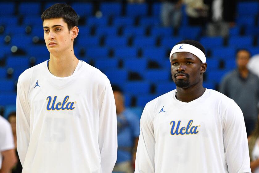 LOS ANGELES, CA - OCTOBER 31: UCLA Bruins center Aday Mara (15) and UCLA Bruins forward Adem Bona (3) look on before a college basketball exhibition game between the Cal State Dominguez Hills Toros and the UCLA Bruins on October 31, 2023, at Pauley Pavilion in Los Angeles, CA. (Photo by Brian Rothmuller/Icon Sportswire via Getty Images)