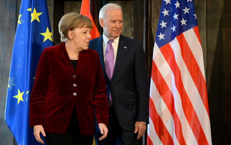 German Chancellor Angela Merkel and Vice President Joe Biden prior to their trilateral talks during the 51st Munich Security Conference (MSC) in Munich, southern Germany, Feb. 7, 2015.