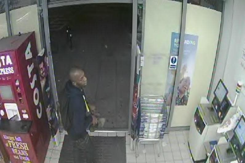 CCTV still: officers want to speak to this man in connection with an attack on a security guard at Tesco (Met Police)