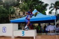 The Wider Image: Haiti's cyclists brave protests and poor roads in race for gold