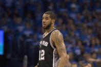 <p>LaMarcus Aldridge with the Spurs withdrew his bid for consideration because of an injury. (Getty) </p>