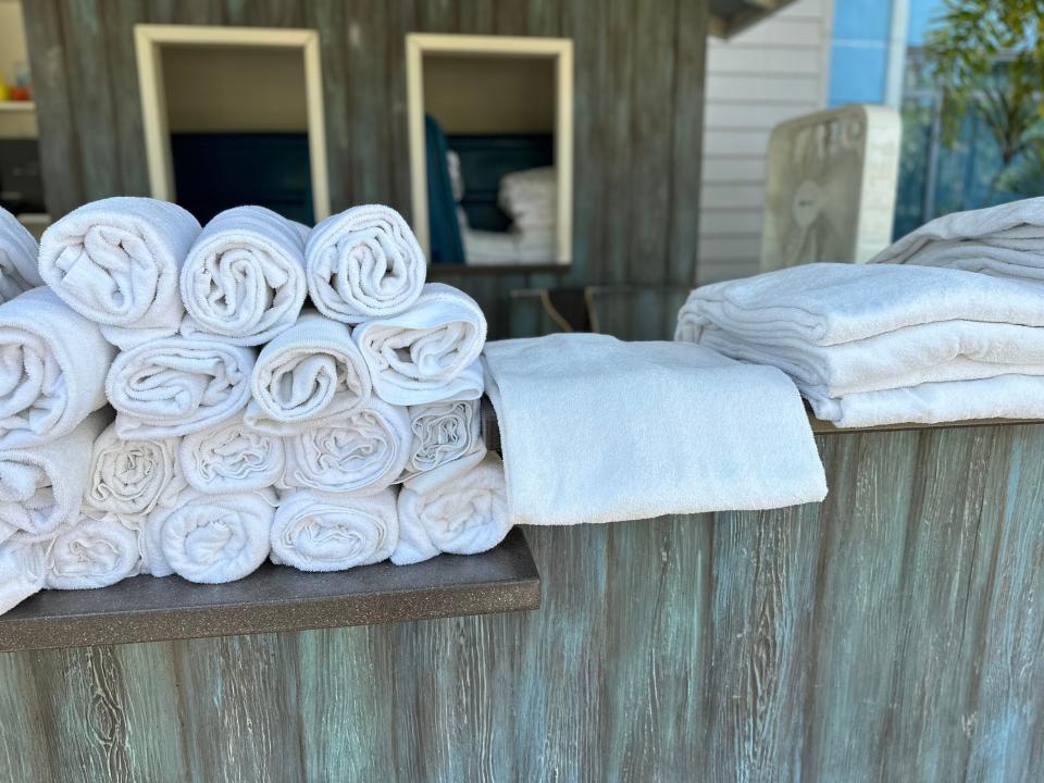stack of towels at the cabanas in sapphire falls resort in universal orlando