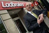 Alistair Meeks poses for a portrait at a branch of Ladbrokes in central London, Britain, May 17, 2016. REUTERS/Toby Melville