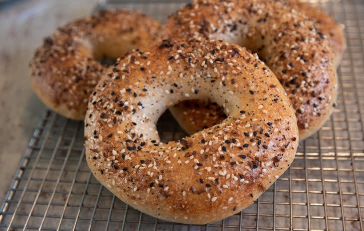 Close-up image of fresh bagels with toppings