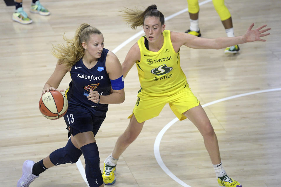 Lauren Cox (left) has been waived by the Indiana Fever just over a year after being selected with the No. 3 pick in the draft. (AP Photo/Phelan M. Ebenhack)